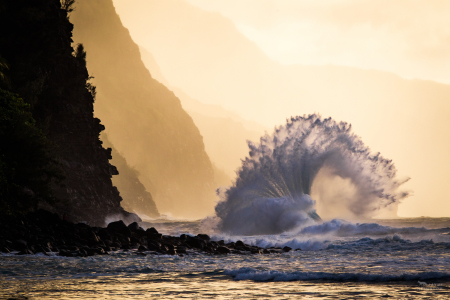 Fan wave crashing on Na Pali shore, Kauai, Hawaii